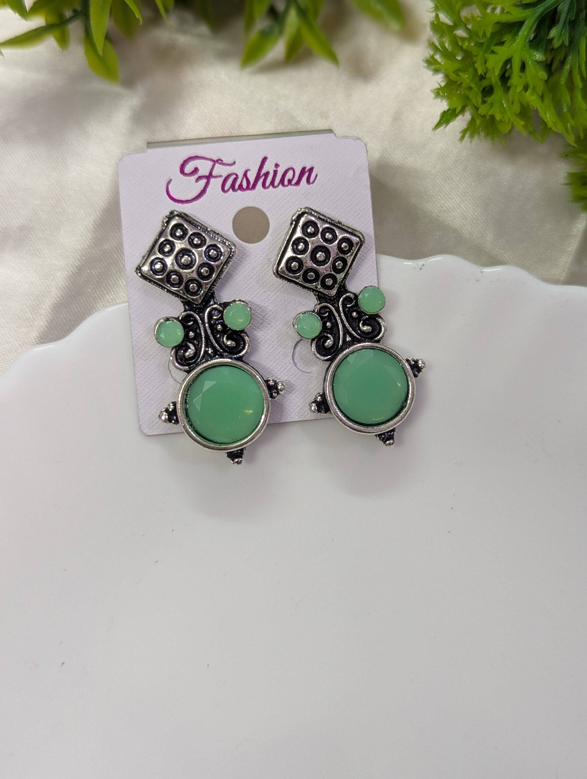 Stud type oxidised earrings _ lite green